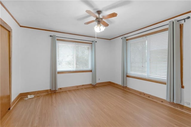 unfurnished bedroom with a closet, ornamental molding, light hardwood / wood-style floors, and ceiling fan