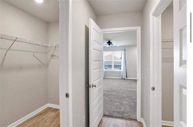 interior space with light wood-style flooring and baseboards