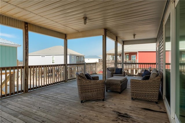 wooden terrace featuring an outdoor living space