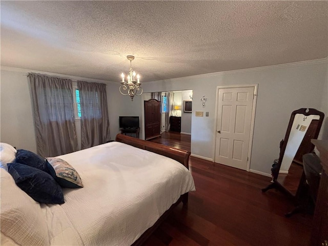 5911 Shenandoah Rd N, Mobile, AL 36608 - bedroom featuring a textured ceiling, wood finished floors, ornamental molding, and a chandelier