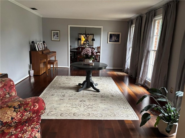 5911 Shenandoah Rd N, Mobile, AL 36608 - interior space featuring ornamental molding, healthy amount of natural light, wood finished floors, and a chandelier
