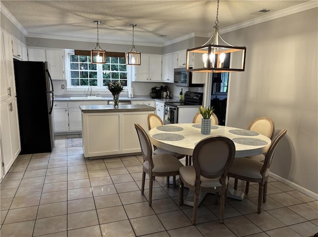 5911 Shenandoah Rd N, Mobile, AL 36608 - dining space featuring light tile patterned floors, crown molding, and a textured ceiling