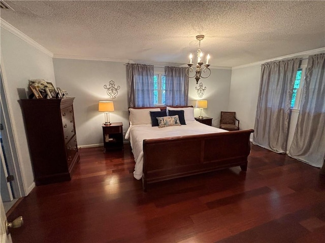 5911 Shenandoah Rd N, Mobile, AL 36608 - bedroom with crown molding, wood finished floors, a textured ceiling, and a chandelier