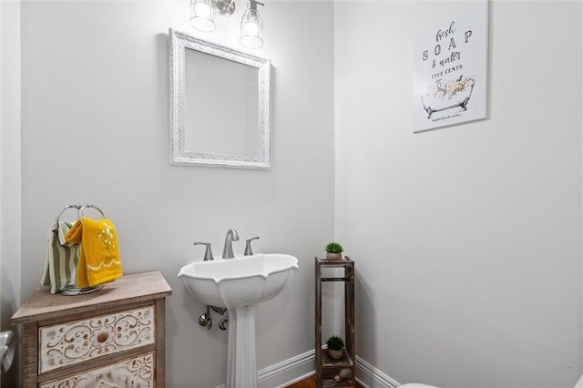 bathroom featuring baseboards