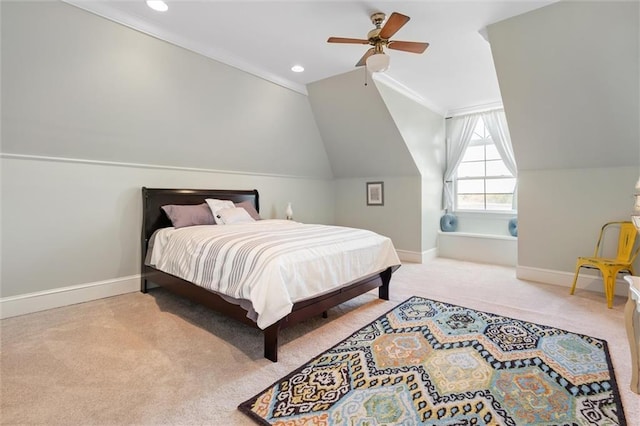 bedroom with carpet, baseboards, ornamental molding, a ceiling fan, and vaulted ceiling