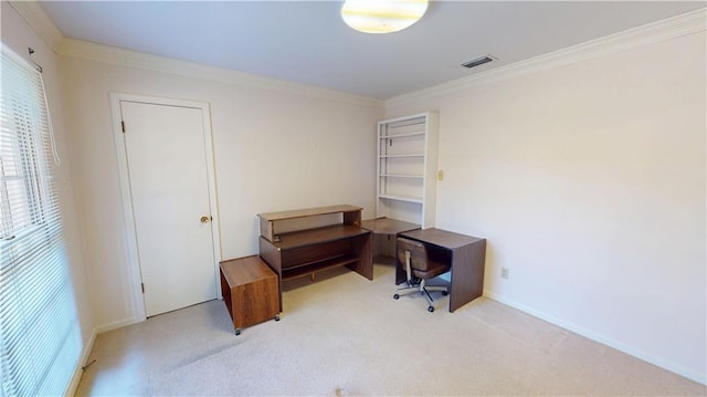 home office featuring light carpet, crown molding, visible vents, and baseboards