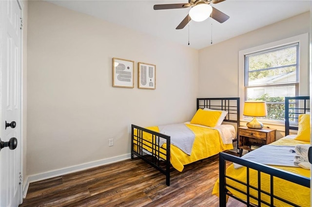 54 Bishop Ln, Mobile, AL 36608 - bedroom with wood finished floors, baseboards, a ceiling fan, and a closet