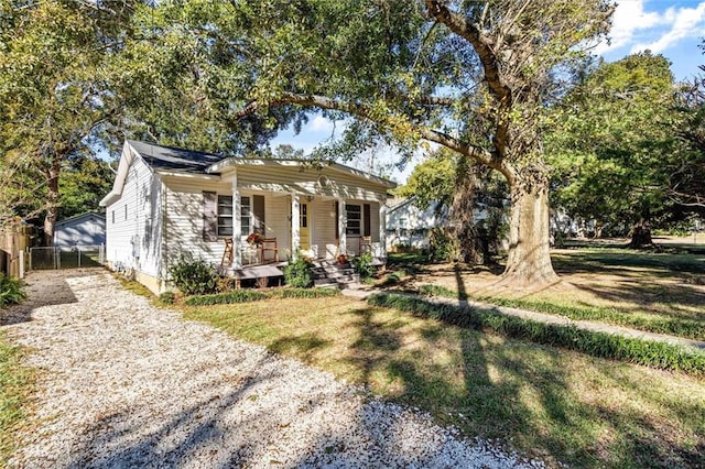 54 Bishop Ln, Mobile, AL 36608 - bungalow-style house featuring covered porch and driveway