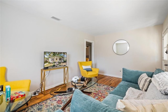 54 Bishop Ln, Mobile, AL 36608 - living room with wood finished floors and baseboards
