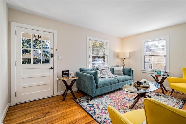 54 Bishop Ln, Mobile, AL 36608 - living room with healthy amount of natural light, light wood-type flooring, and baseboards