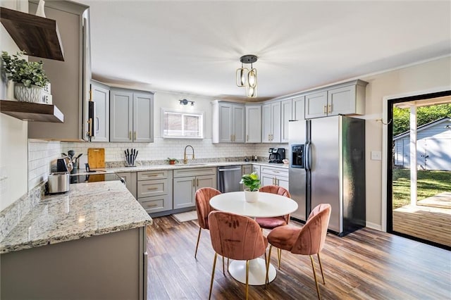 54 Bishop Ln, Mobile, AL 36608 - kitchen with stainless steel appliances, gray cabinets, open shelves, and a sink
