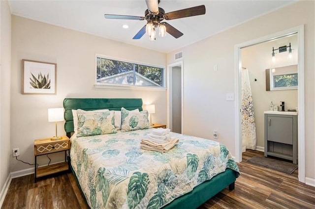 54 Bishop Ln, Mobile, AL 36608 - bedroom featuring wood finished floors, baseboards, recessed lighting, a ceiling fan, and connected bathroom