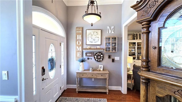 entrance foyer featuring dark wood-style floors and baseboards