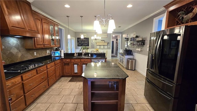 kitchen featuring black fridge, custom range hood, open shelves, gas stovetop, and a peninsula