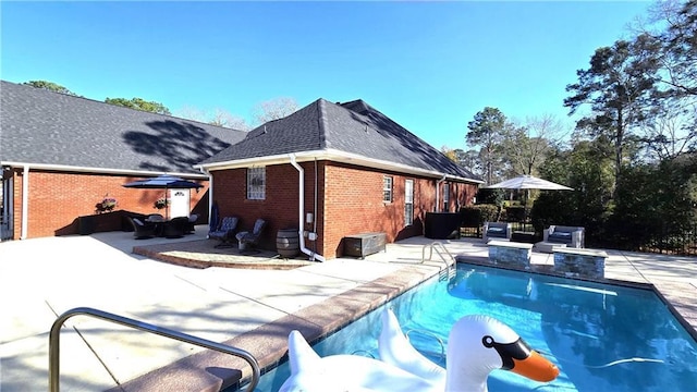 outdoor pool with a patio