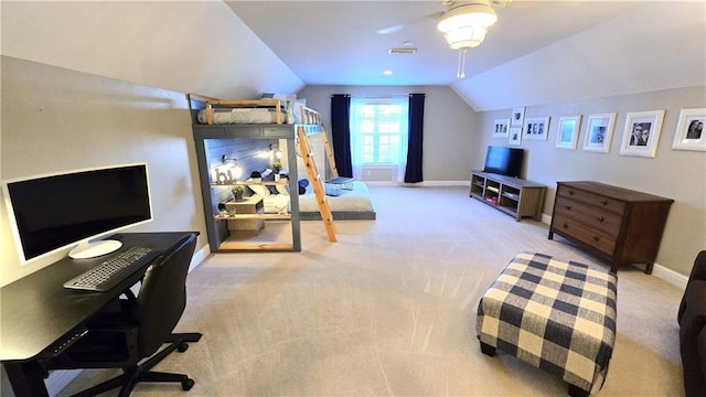 carpeted bedroom featuring vaulted ceiling, baseboards, and ceiling fan