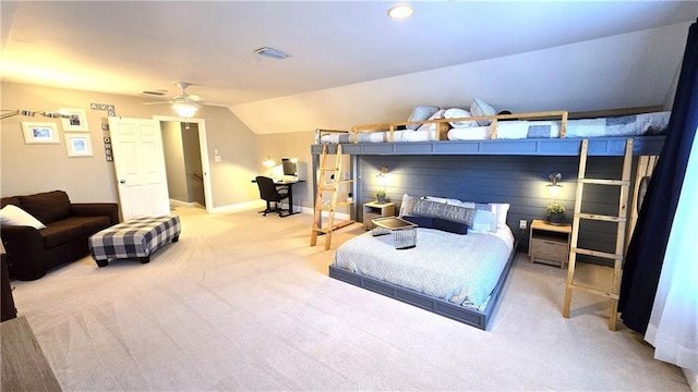 bedroom with visible vents, baseboards, lofted ceiling, and carpet floors