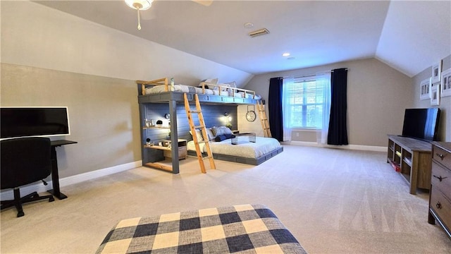 bedroom featuring carpet floors, visible vents, baseboards, and vaulted ceiling