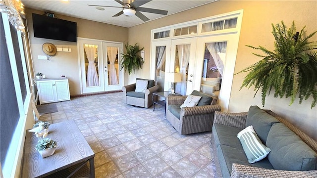 exterior space with a ceiling fan and french doors