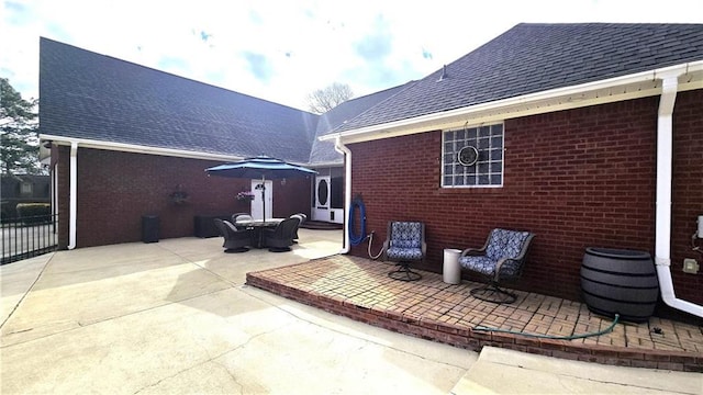 view of patio featuring outdoor dining area