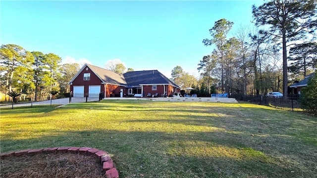 exterior space featuring a garage and fence