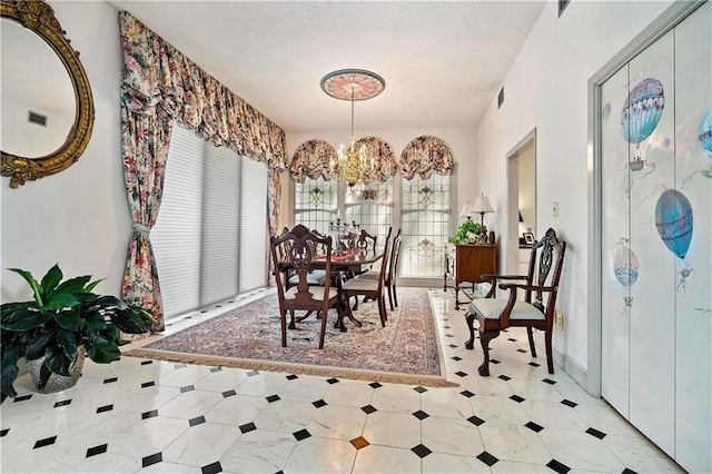 110 Schooley Cir, Daphne, AL 36526 - dining space featuring a chandelier and light floors