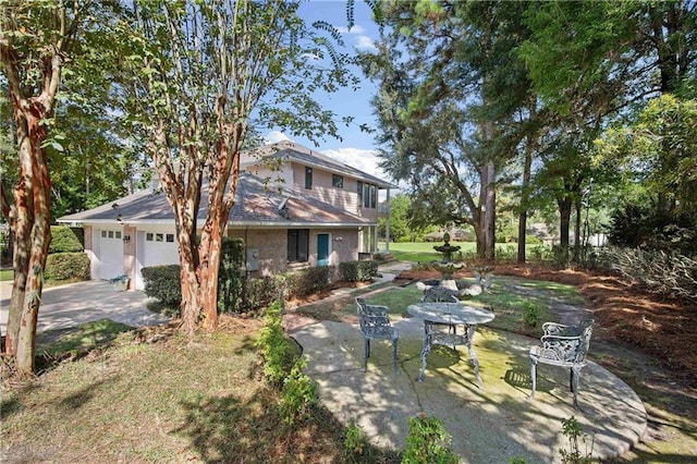 110 Schooley Cir, Daphne, AL 36526 - view of yard featuring an attached garage and driveway