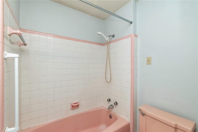 bathroom featuring  shower combination and toilet