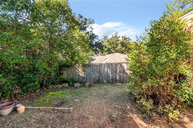 view of yard featuring fence