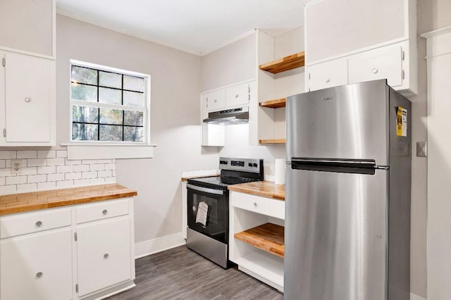 kitchen with butcher block counters, tasteful backsplash, appliances with stainless steel finishes, dark hardwood / wood-style flooring, and white cabinets