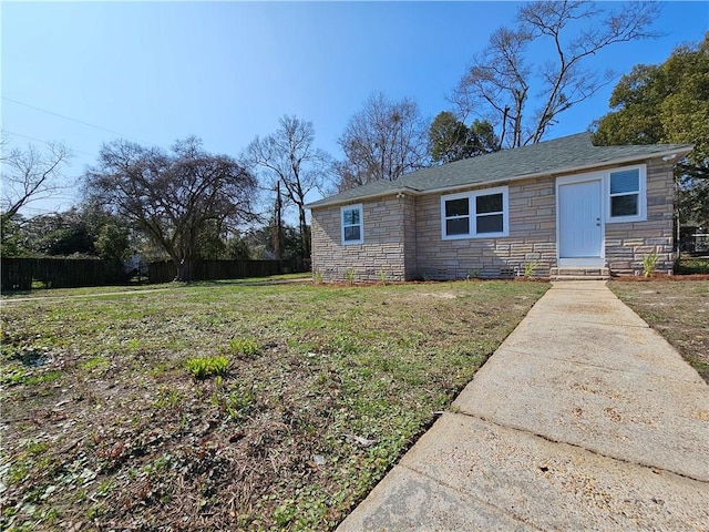 ranch-style house with a front yard