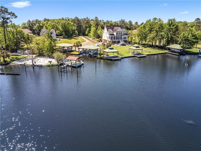 water view with boat lift and a dock