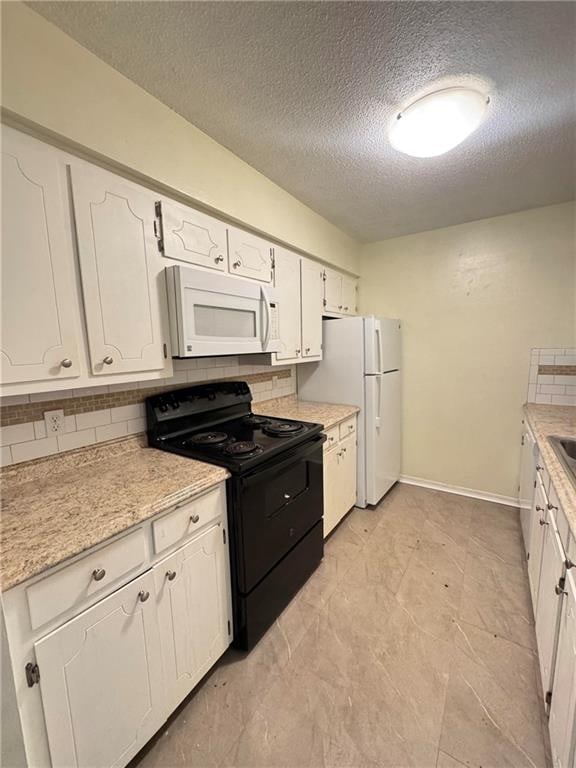 kitchen with decorative backsplash, white appliances, white cabinetry, and a textured ceiling