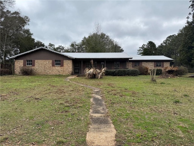 ranch-style house with a front lawn