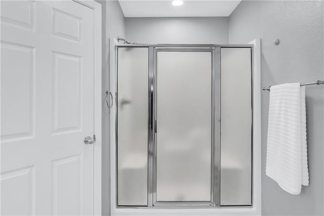 bathroom with a stall shower