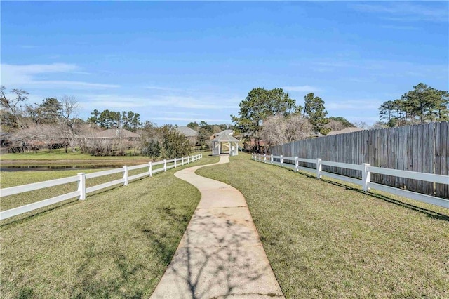 view of yard with a fenced backyard