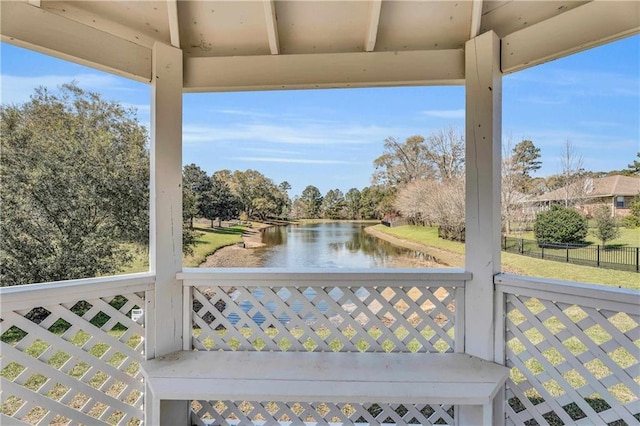 exterior space with a water view