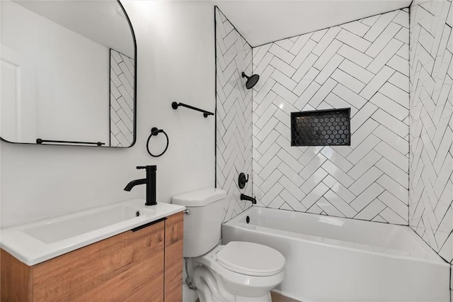 full bathroom with vanity, toilet, and tiled shower / bath combo