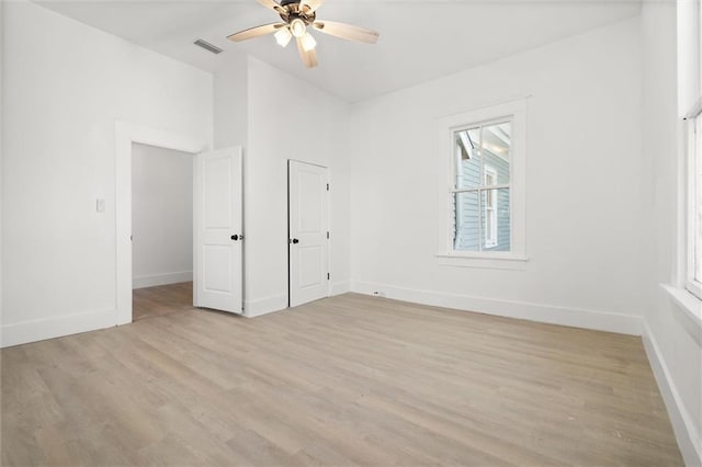 unfurnished bedroom featuring ceiling fan and light wood-type flooring