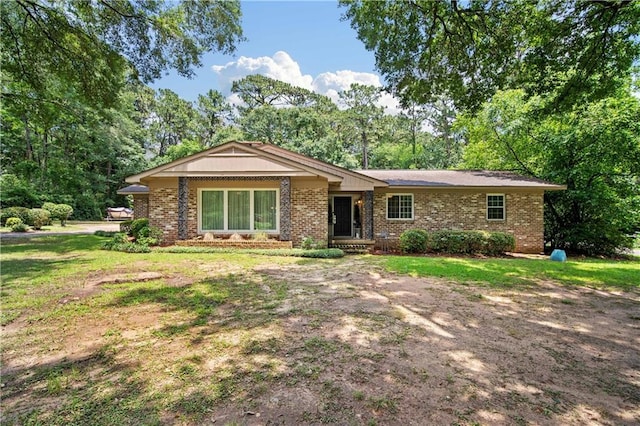 361 Tatum Ave, Mobile, AL 36609 - ranch-style home with brick siding and a front yard