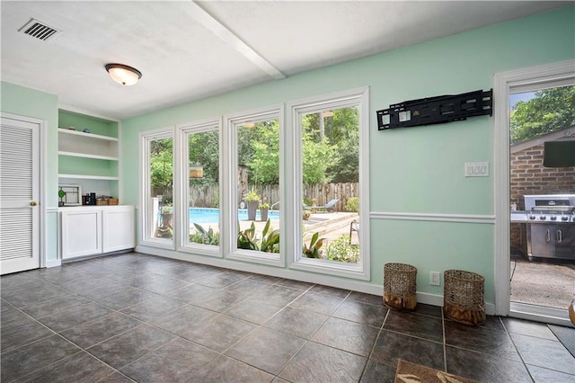 361 Tatum Ave, Mobile, AL 36609 - doorway to outside with baseboards