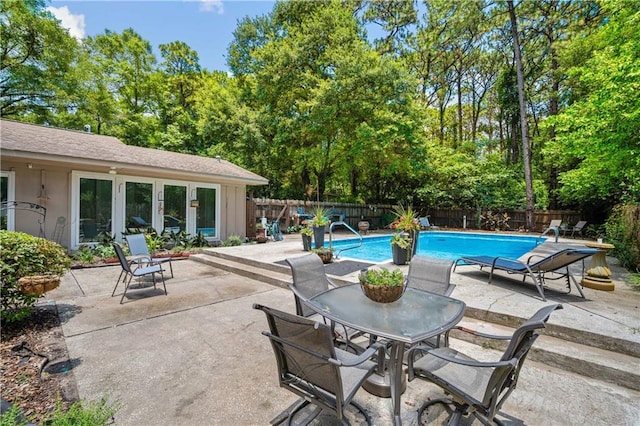 361 Tatum Ave, Mobile, AL 36609 - view of swimming pool featuring a fenced backyard, a patio, and outdoor dining area