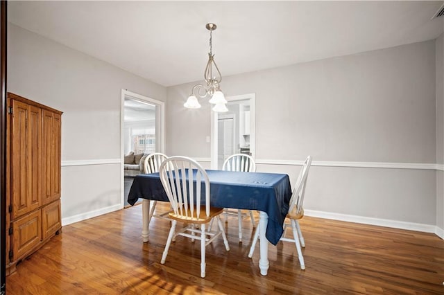 361 Tatum Ave, Mobile, AL 36609 - dining space featuring a chandelier and wood finished floors