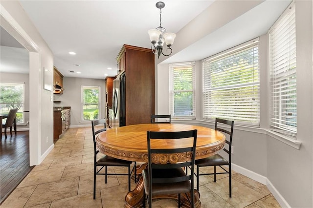 9100 Johnson Rd S, Mobile, AL 36695 - dining space featuring baseboards, a chandelier, and recessed lighting