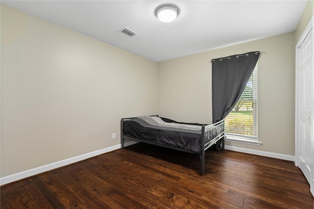 9100 Johnson Rd S, Mobile, AL 36695 - bedroom featuring baseboards and hardwood / wood-style flooring