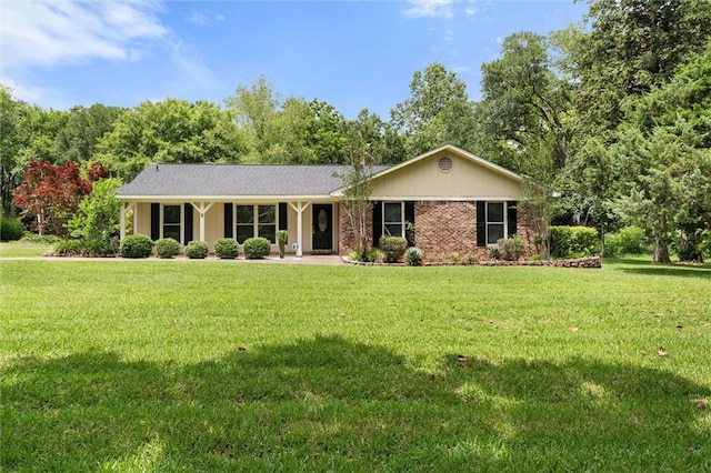 9100 Johnson Rd S, Mobile, AL 36695 - single story home with a front lawn and brick siding