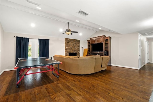 9100 Johnson Rd S, Mobile, AL 36695 - rec room with a brick fireplace, dark wood finished floors, a ceiling fan, baseboards, and recessed lighting
