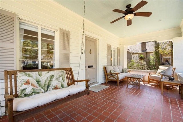 sunroom / solarium with ceiling fan