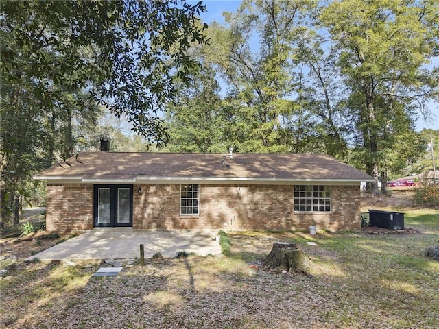 rear view of property with a patio