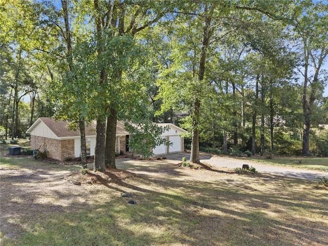 view of yard with a garage